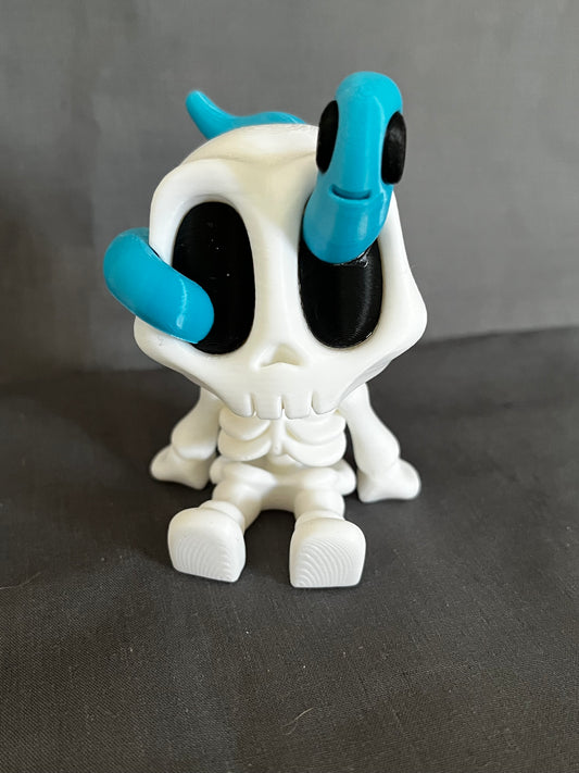 Bloblab sitting skeleton with Worm